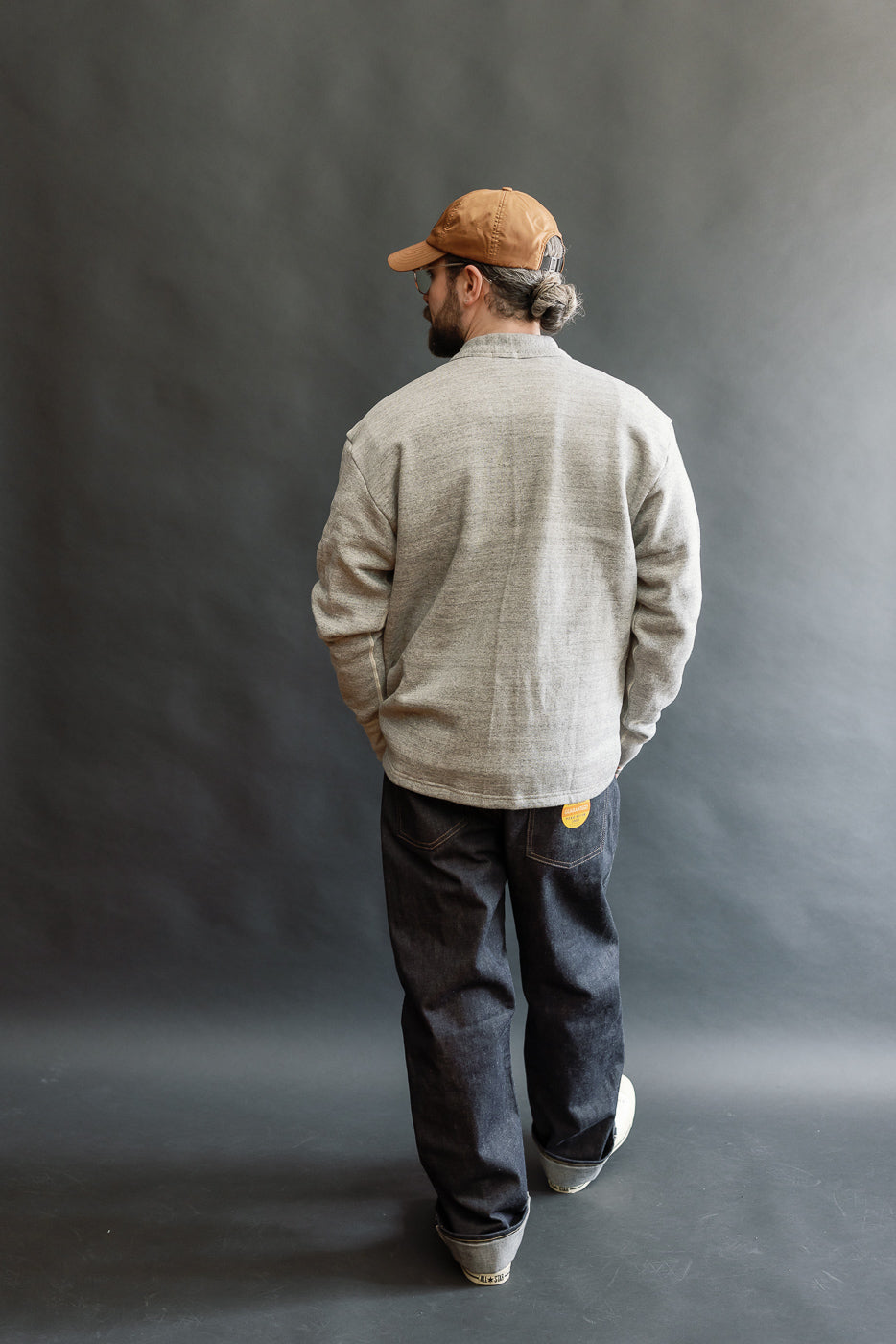 Full body rear view of male model 5'9