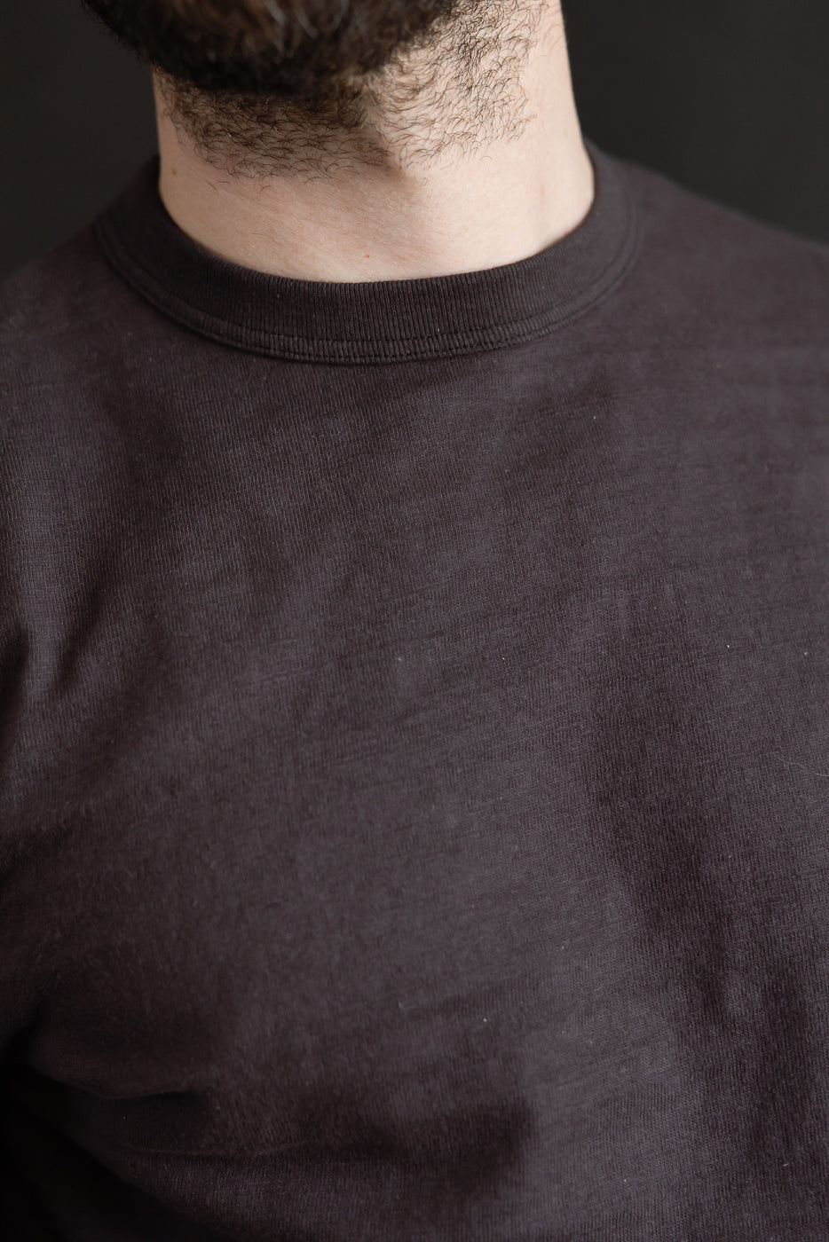 Close-up front of Warehouse & Co Lot 5906 slubby cotton long sleeve T-shirt collar, male model, Dant