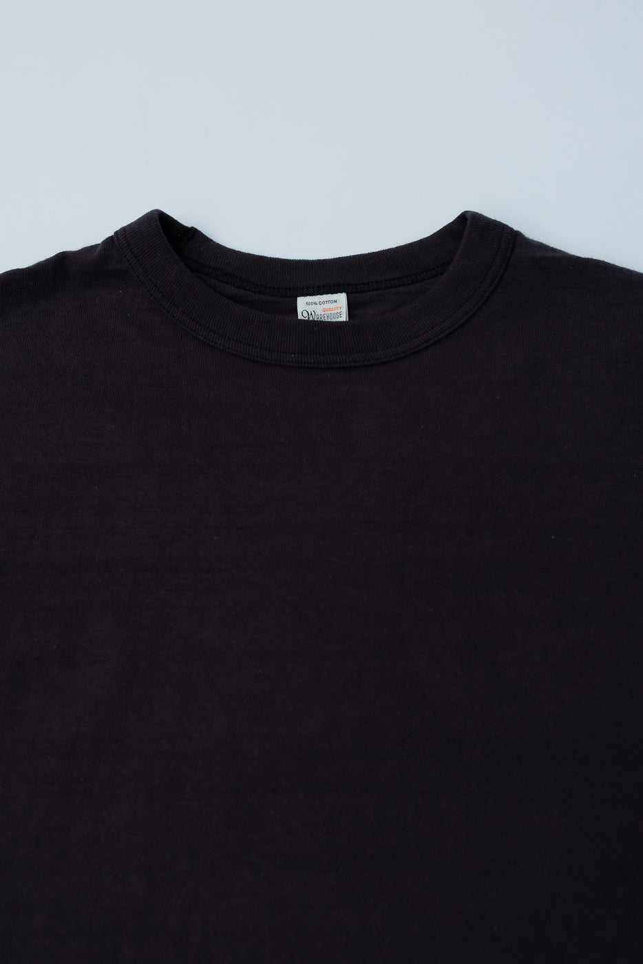 Close-up of front chest and collar on Warehouse & Co. Lot 5906 black slubby cotton T-shirt