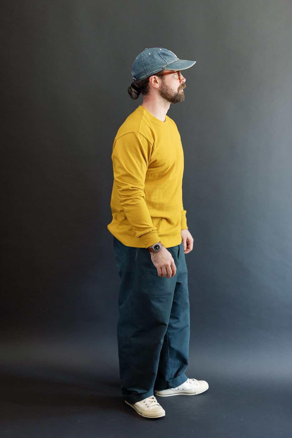 Full body profile view of a 5'9
