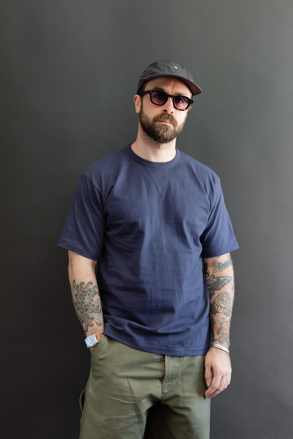 Full body front view of a male model, 5'9