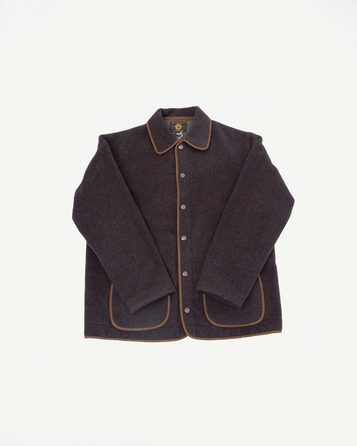 Front flat lay of a charcoal wool jacket with brown piping and silver buttons.