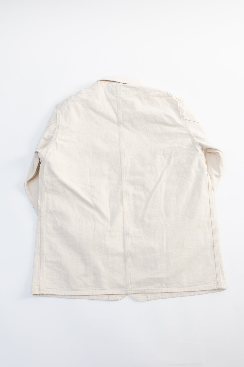 Flat lay of John Gluckow Lot JG-29 House Painters Jacket in ecru, full back view, cotton fabric