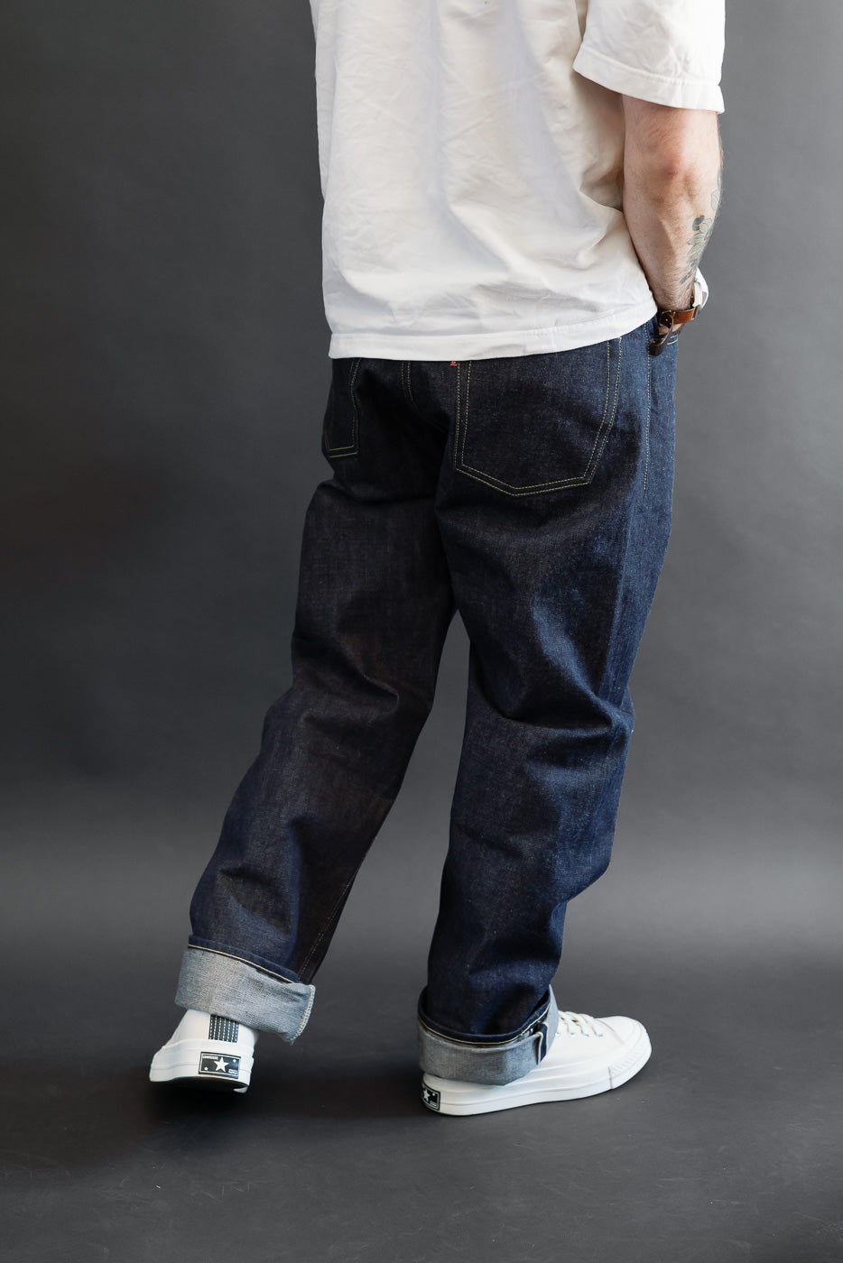 Full body back view of a male model, 5'9