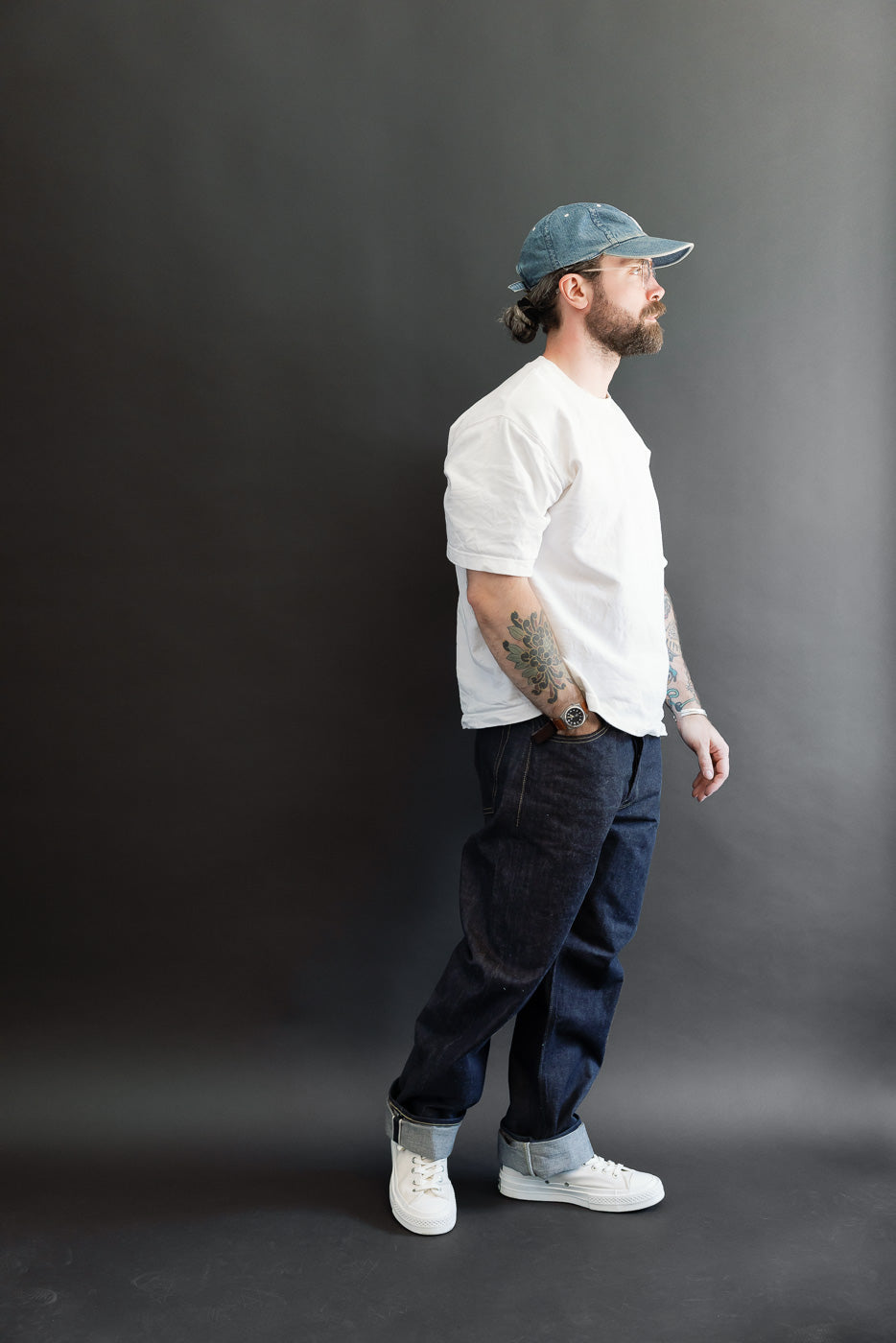 Full body, right side view of a male model, 5'9