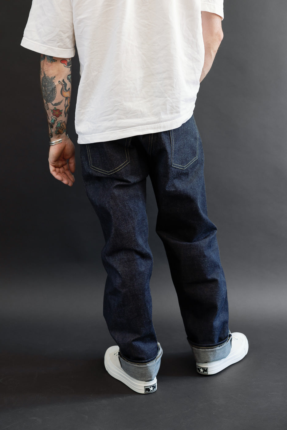 Full body back view of a male model, 5'9
