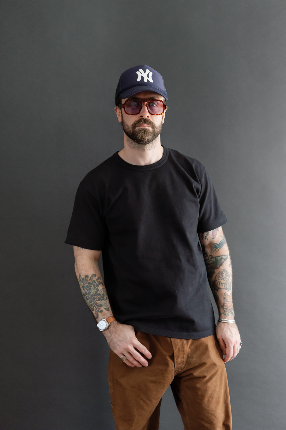 Full body front view of a male model, 5'9