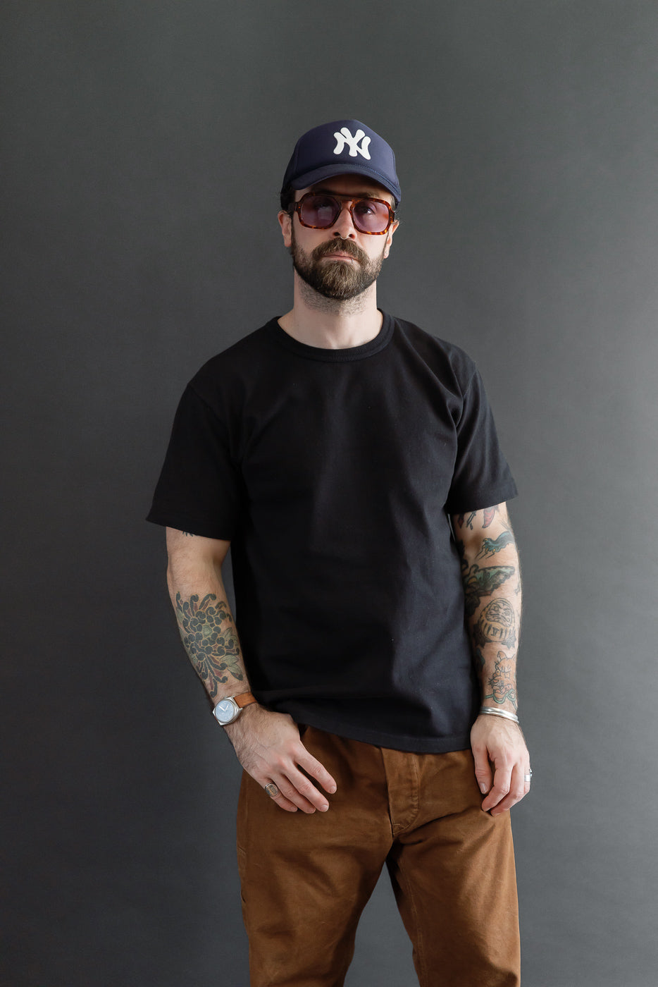 Full body front view of a male model, 5'9