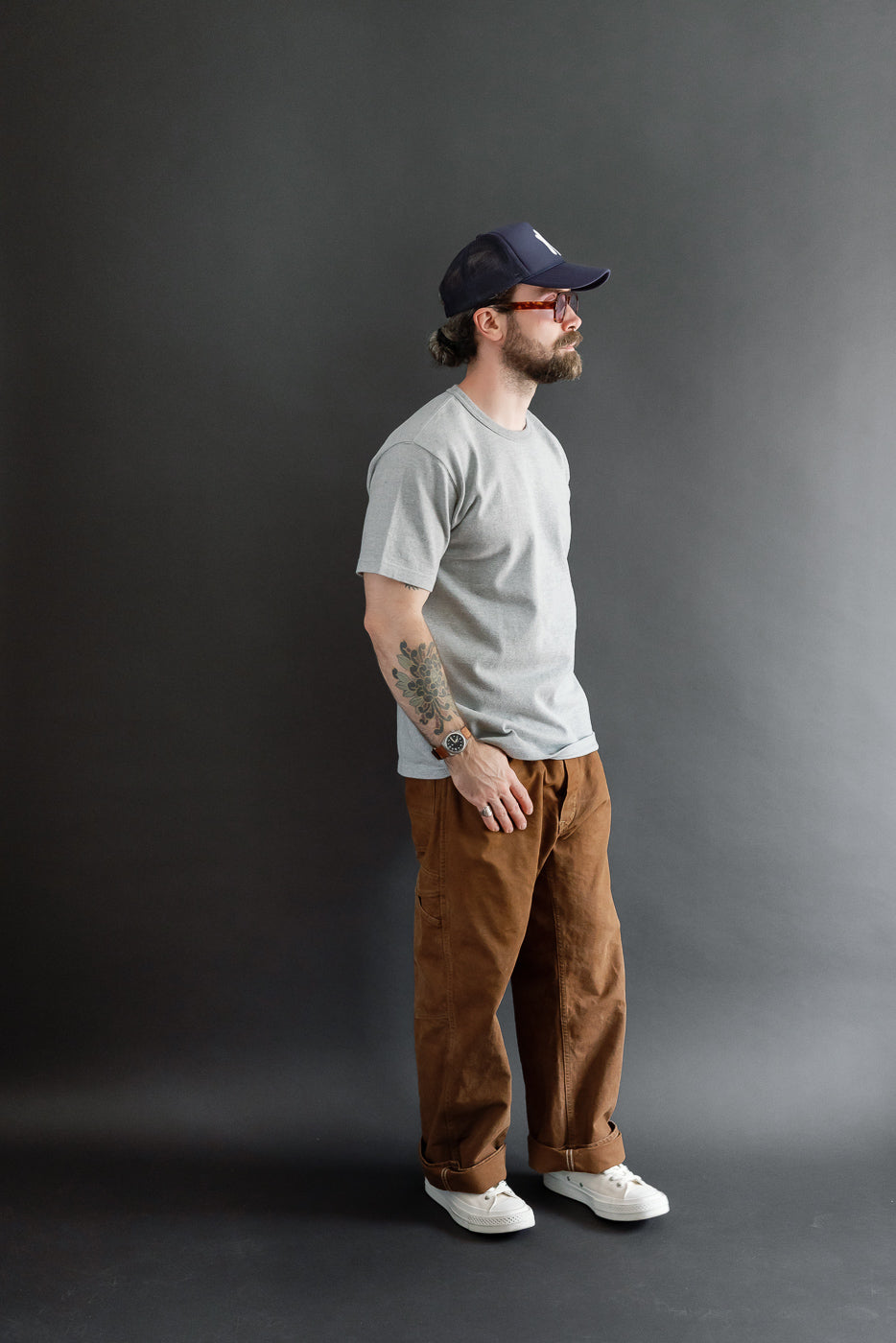 Full body side view of a male model, 5'9