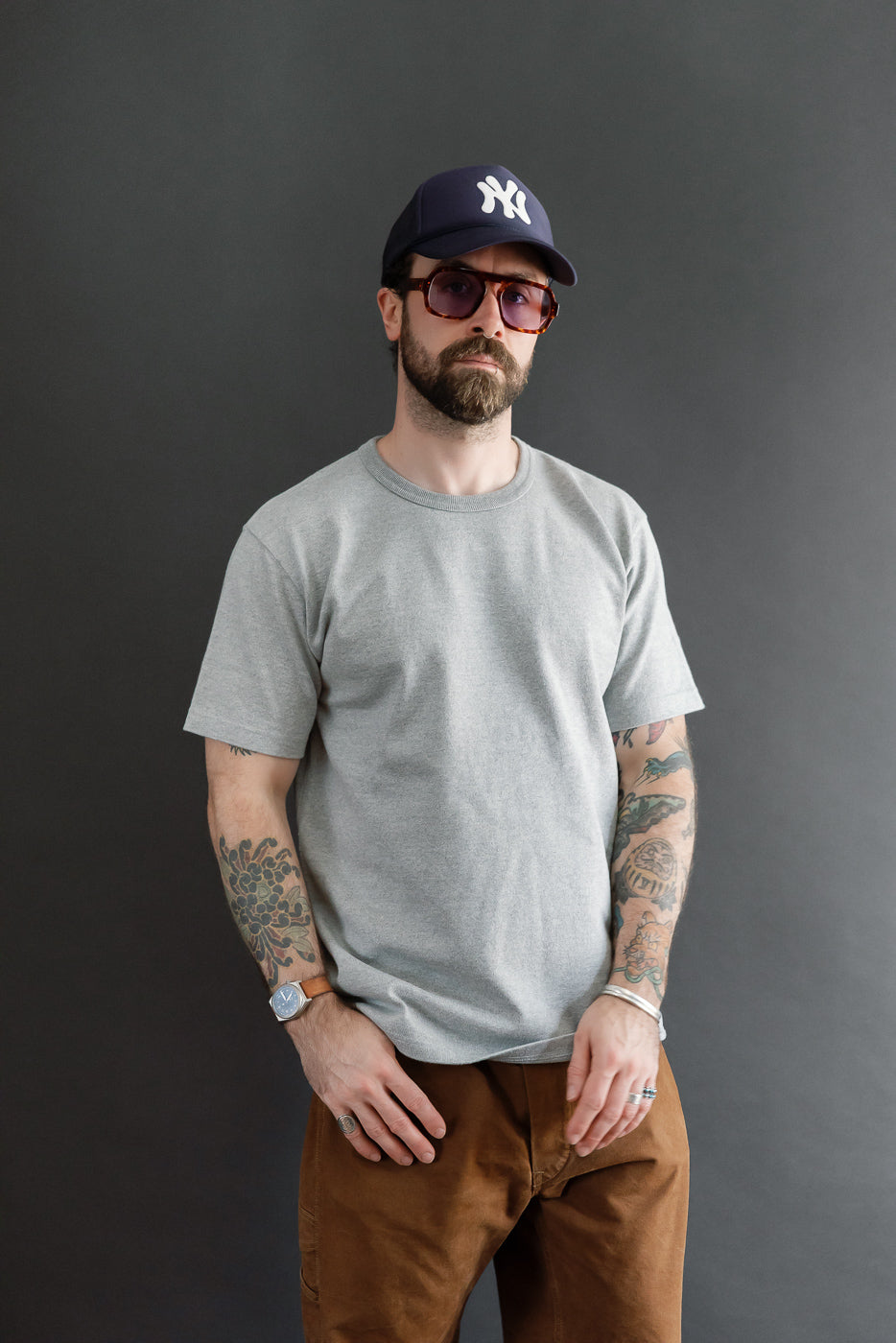 Full body front view of a male model, 5'9