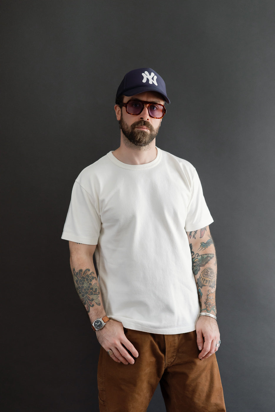 Full body front view of a male model, 5'9