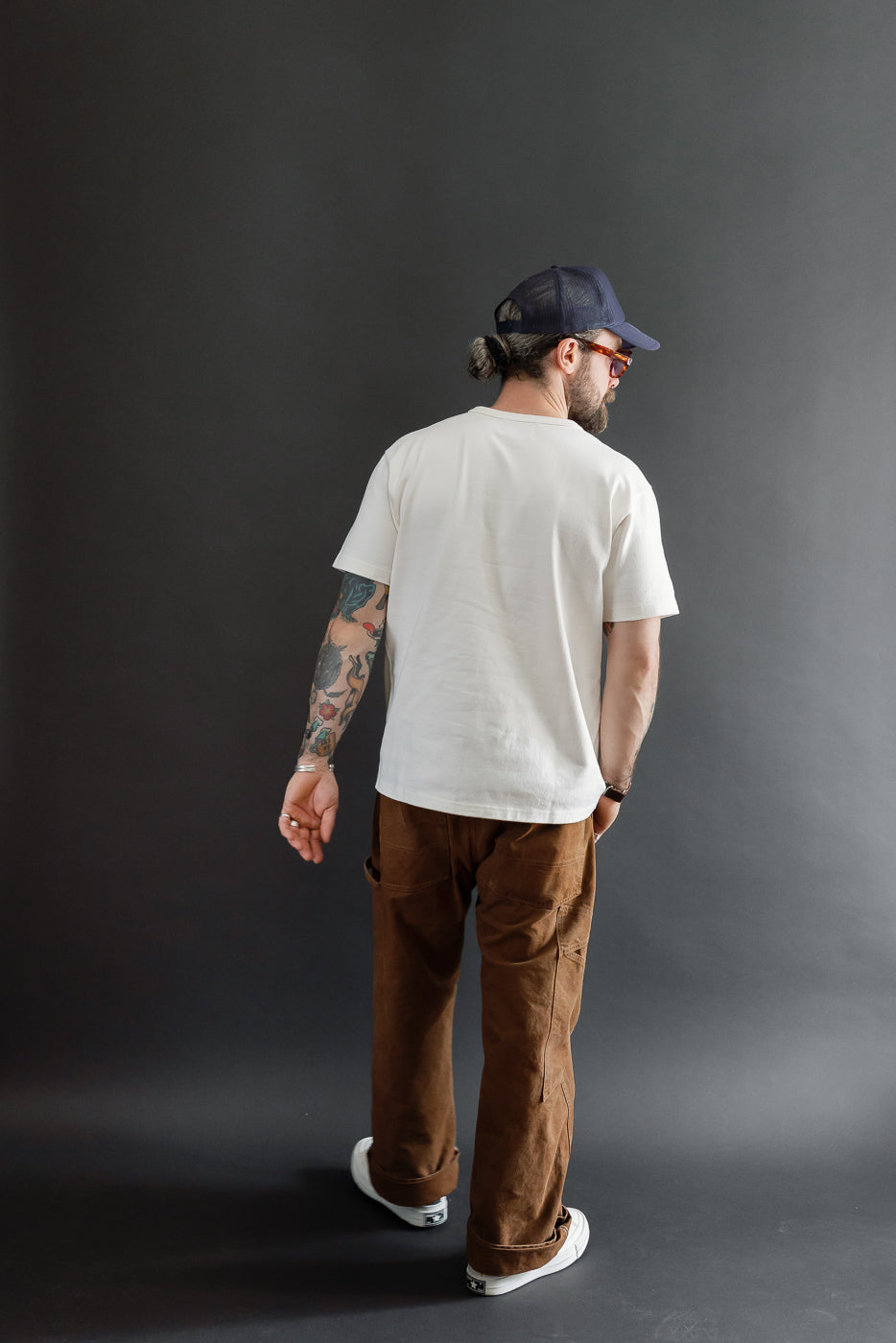 Full body back view of a male model, 5'9