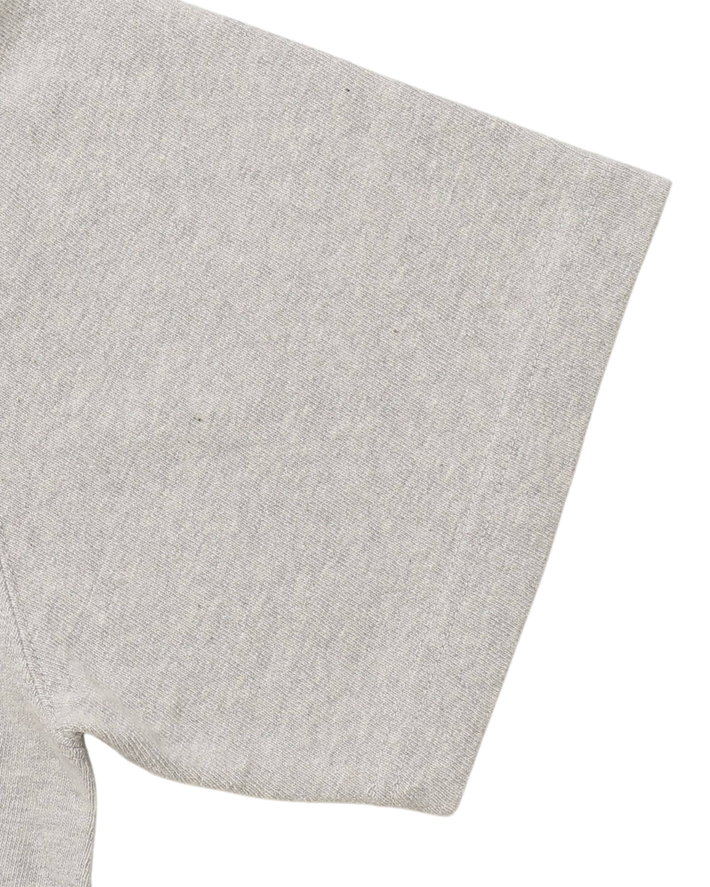 Close-up of left sleeve, front side, heather grey recycled cotton slub crewneck t-shirt.