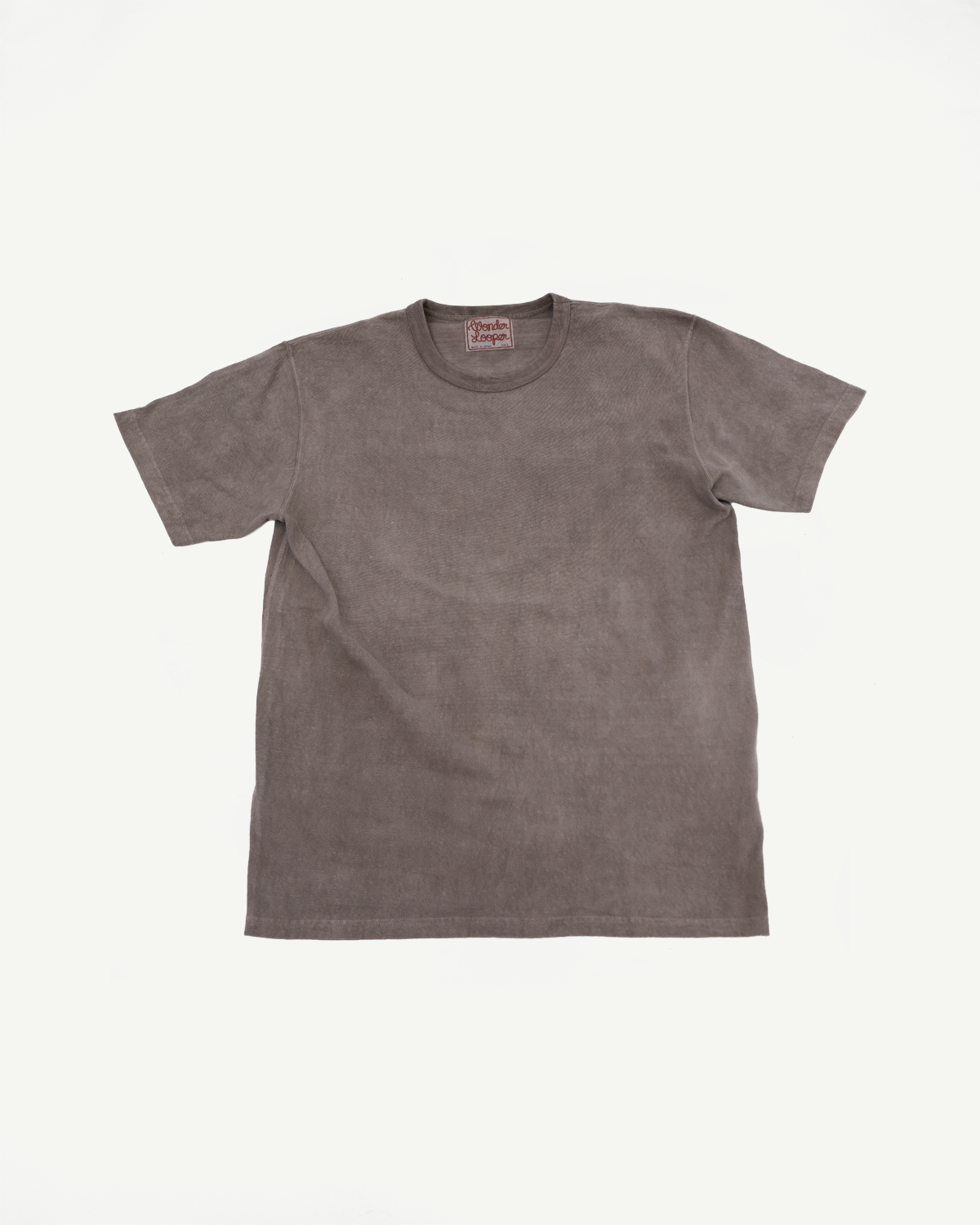 Front flat lay of gray short-sleeve t-shirt with visible tag, showcasing fabric texture and crew neck design.