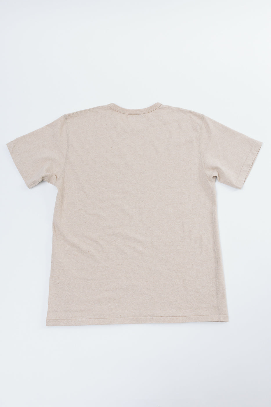 Beige men's short sleeve tee, back view flat lay, ribbed crew neck, clean hem, soft cotton blend fabric