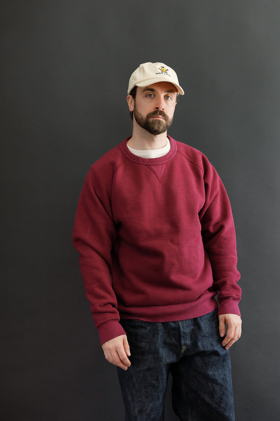 Full body front view of a male model, 5'9