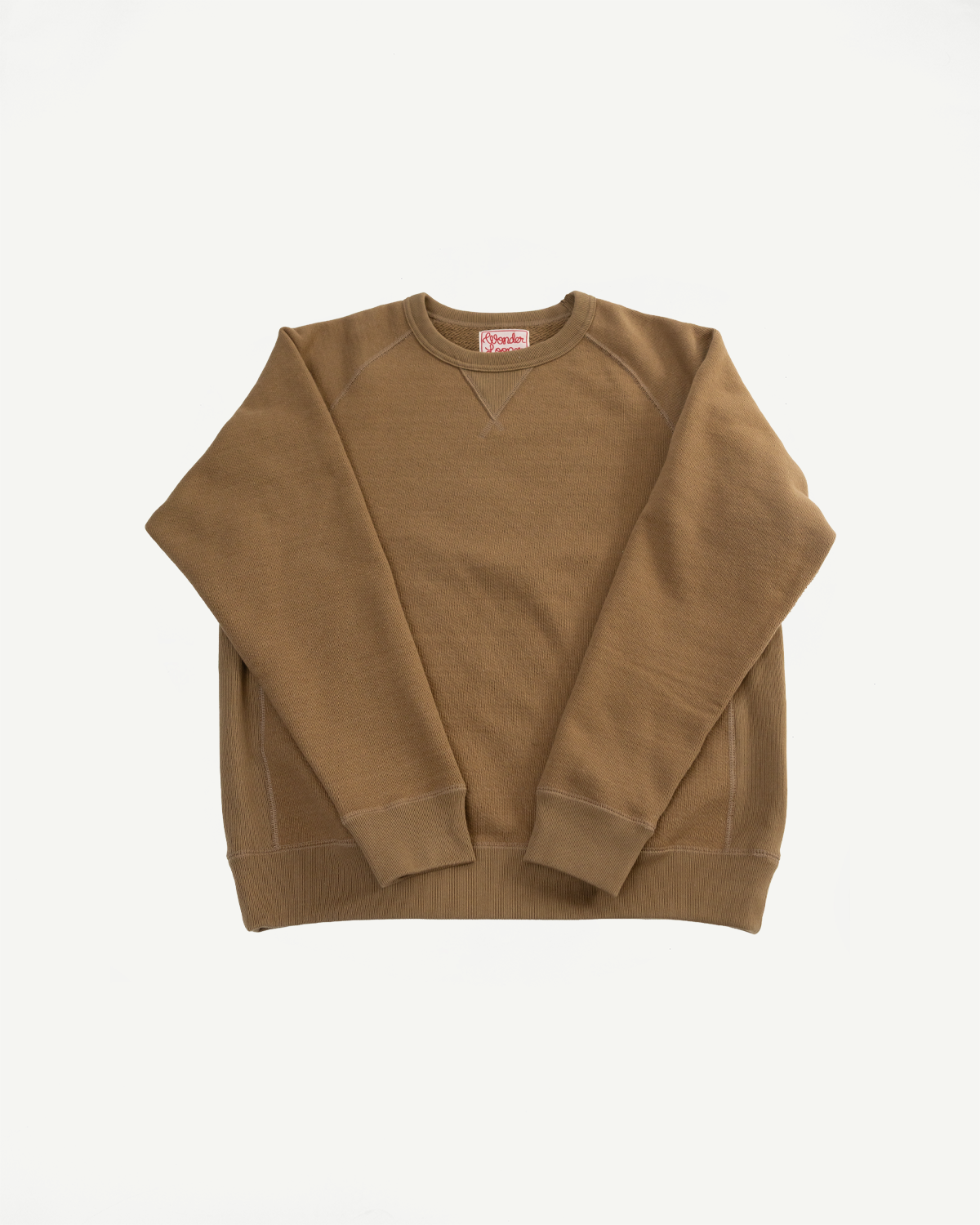 Flat lay front view of Wonder Looper dune crewneck pullover, heavyweight French terry, visible tag, long sleeves, ribbed cuffs and hem, Dant contemporary casual apparel.