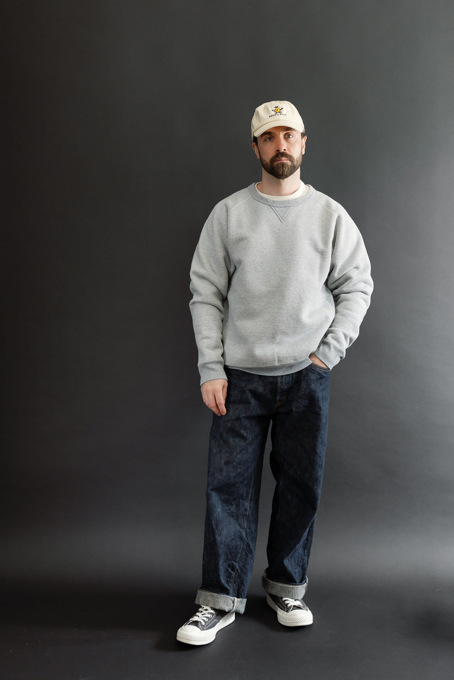 Full body front view of a male model, 5'9