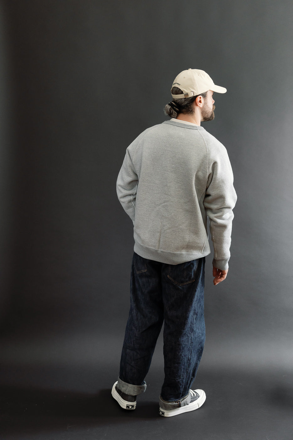 Full body back view of a male model, 5'9