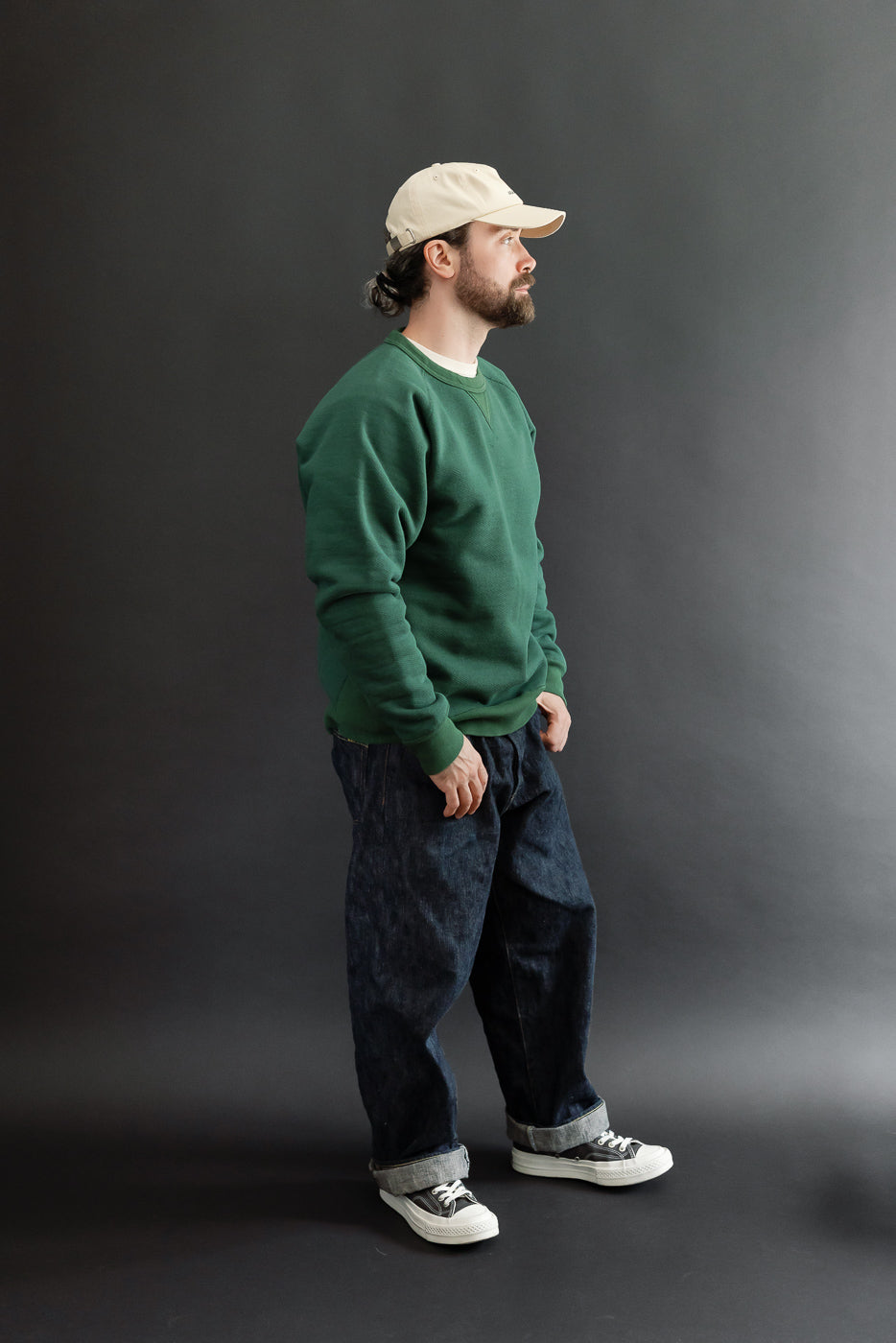 Full body side view of a male model, 5'9
