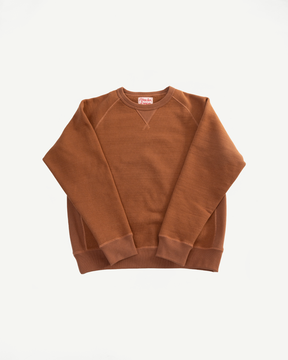 Rust French terry pullover crewneck, flat lay front, ribbed cuffs and hem, Wonder Looper tag
