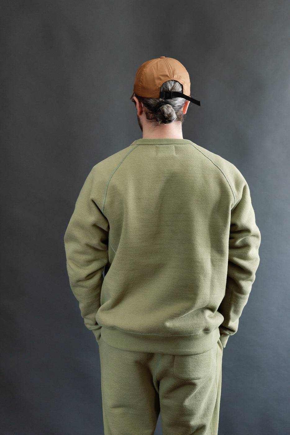 Back view of male model 5'9