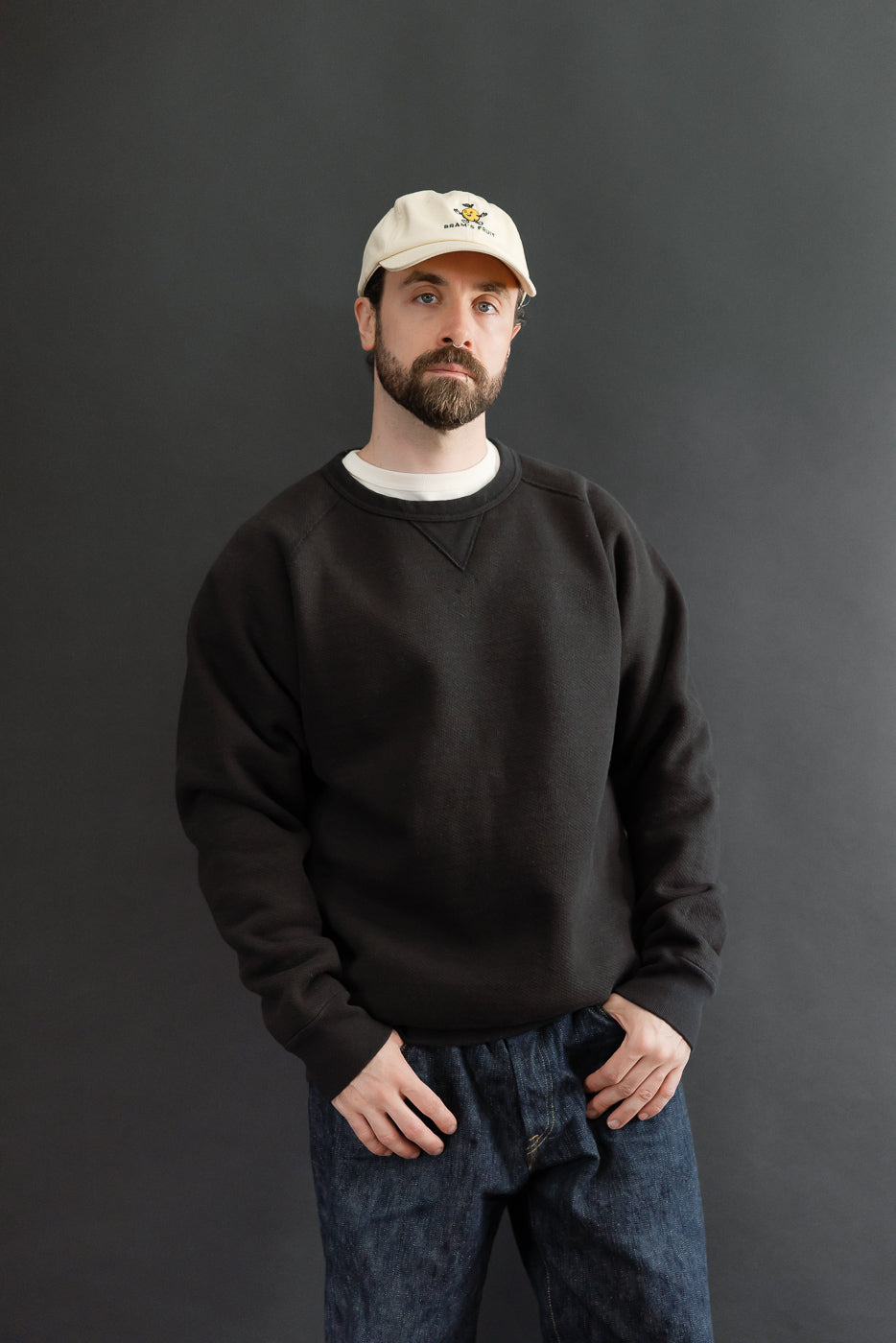 Full body front view of a male model, 5'9