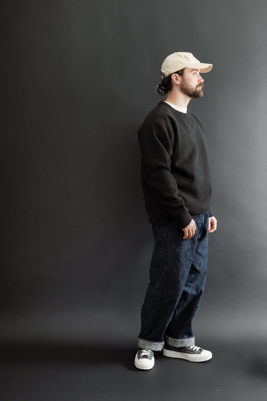 Full body profile view of a male model, 5'9