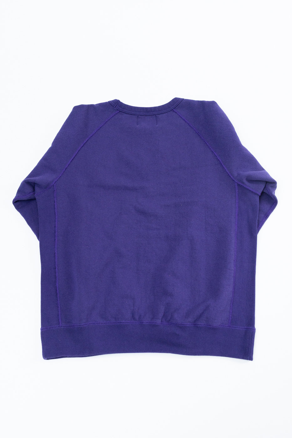 Purple raglan sweatshirt back view, flat lay, ribbed hem and cuffs, athletic fit