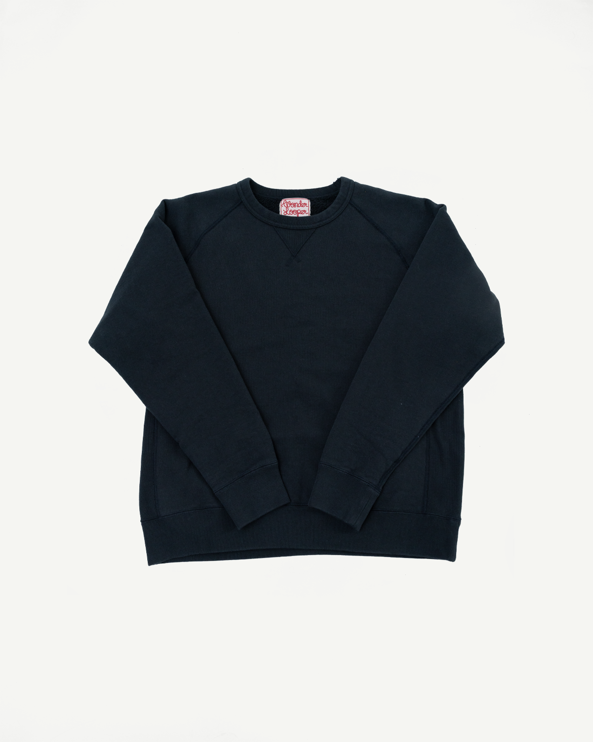 Pullover Crewneck - Super Looper French Terry - Sumi laid flat, showcasing ribbed cuffs, hem, and neckline. The textured Tsuriami knit fabric hints at the craftsmanship behind this premium Japanese-made garment.