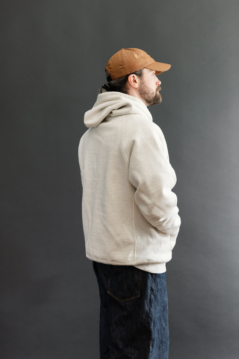Full body side view of a male model, 5'9