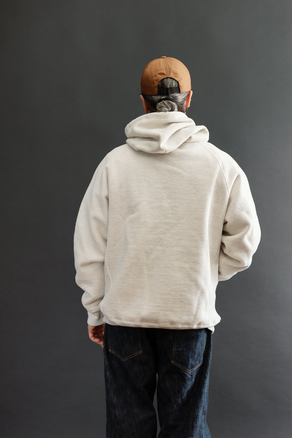 Full body back view of a male model, 5'9