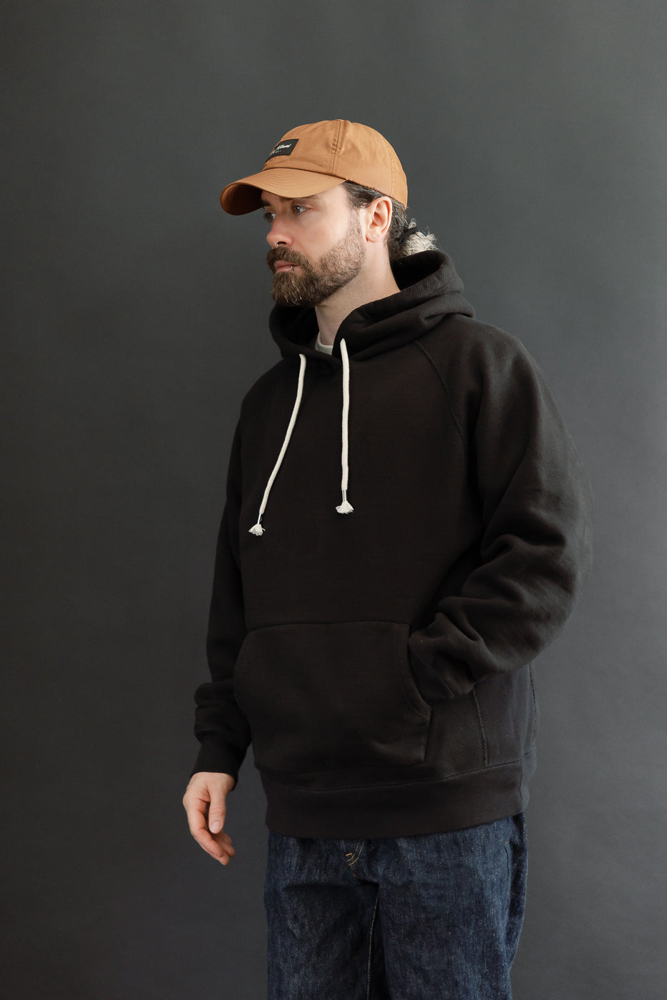 Full body side view of a male model, 5'9