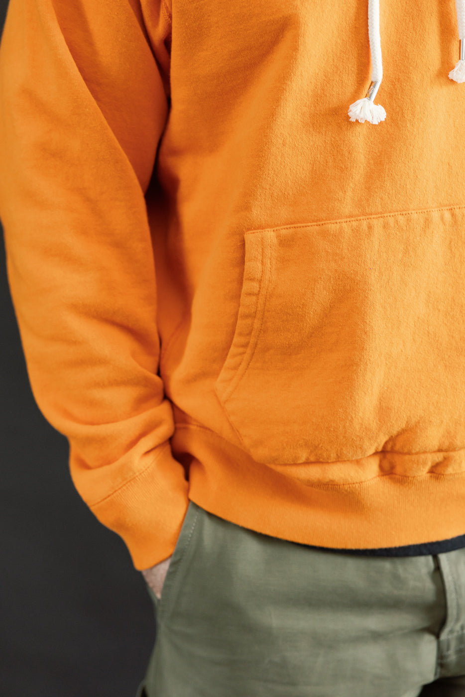 Pullover Hoodie - Super Looper French Terry - Orange: Features a textured loopback fabric with a smooth exterior, white drawstrings, and a kangaroo pocket, highlighting Wonder Looper's modern athletic silhouette.