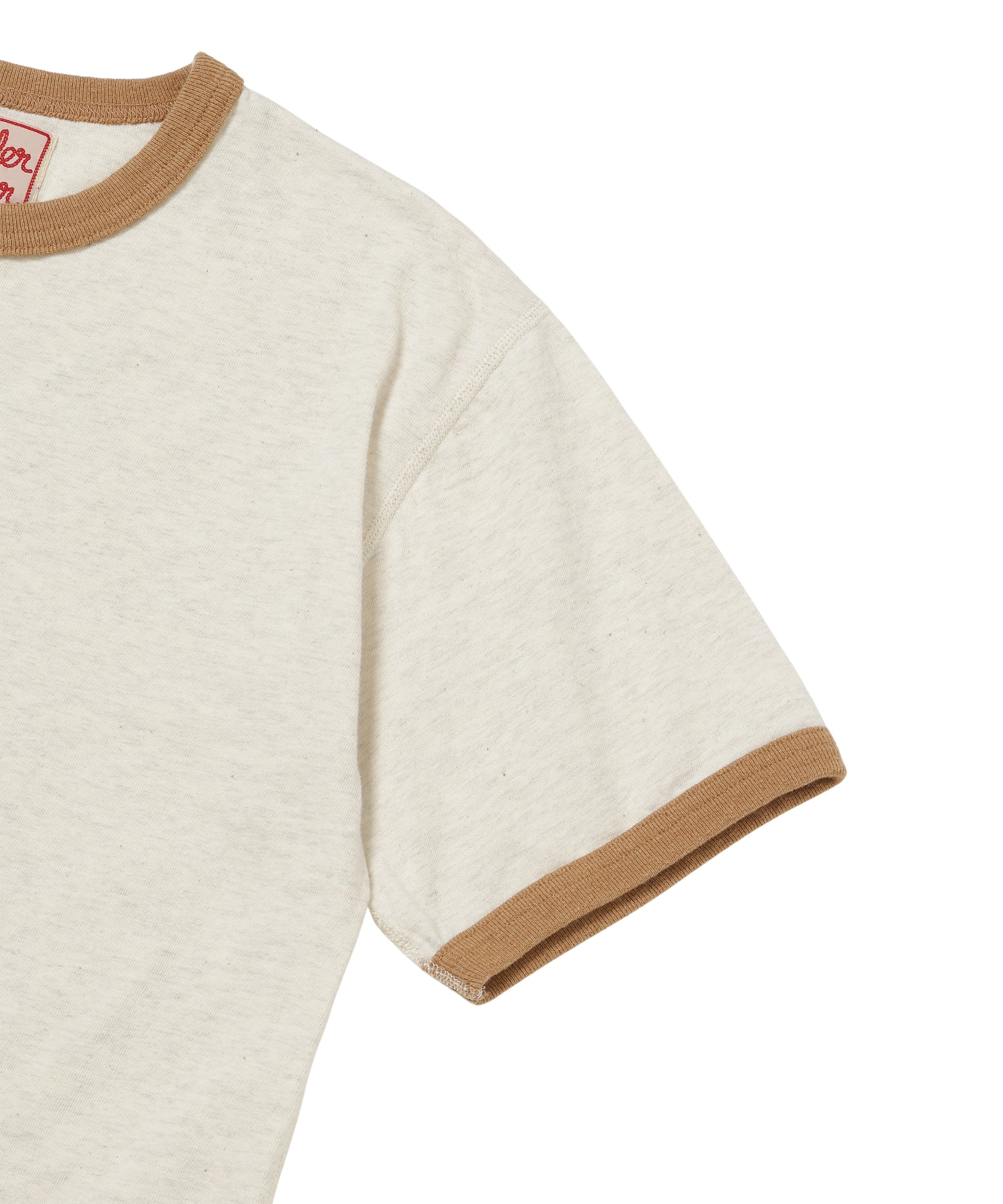Close-up of front upper left of sand ringer t-shirt, showing brown collar and sleeve trim detail.