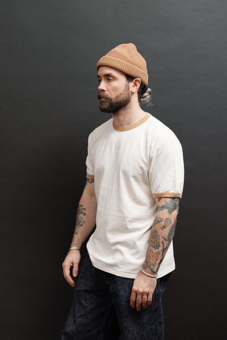 Full body side view of a male model, 5'9