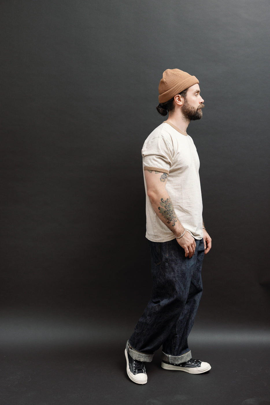 Full body side view of a male model, 5'9