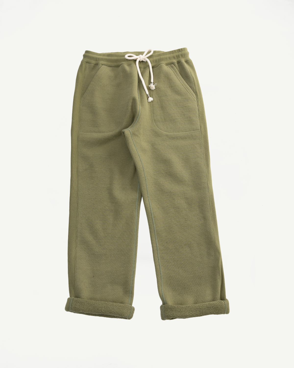 Flat lay front view of sage green double heavyweight French terry sweatpants with drawstring waist and cuffed hems from Dant.