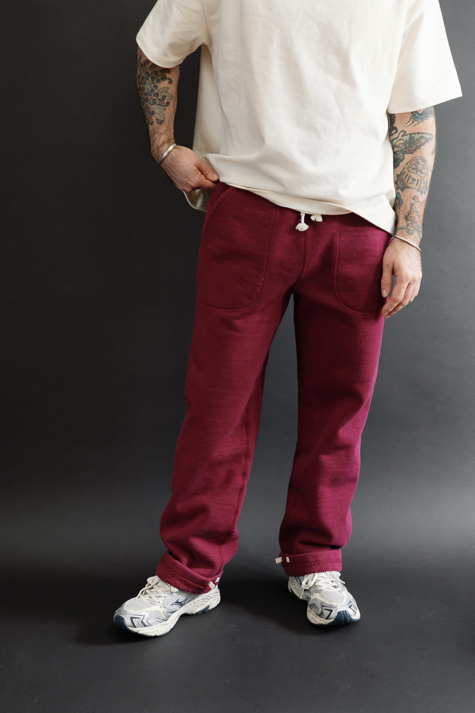 Full body front view of a male model, 5'9