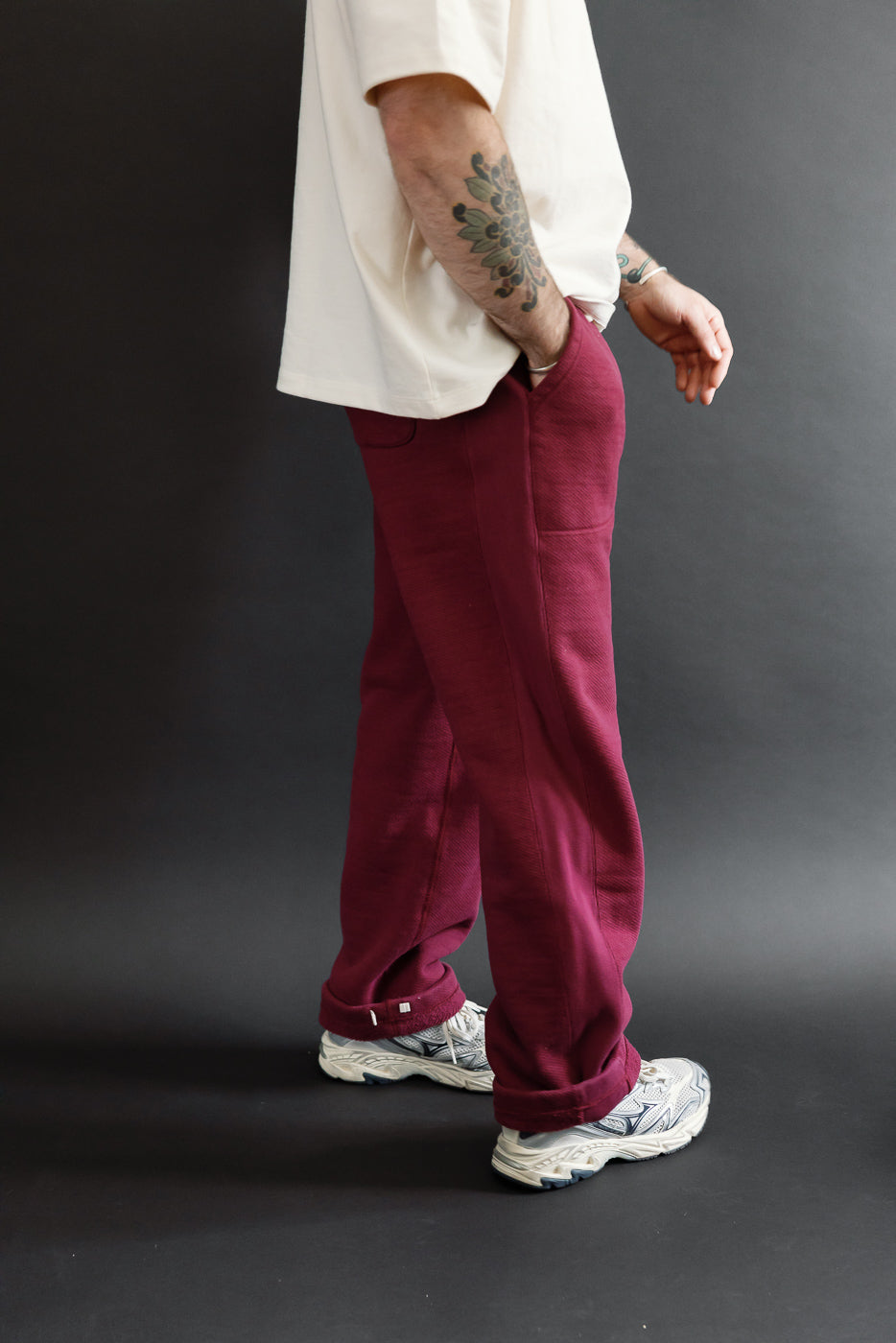 Full body side view of a male model, 5'9