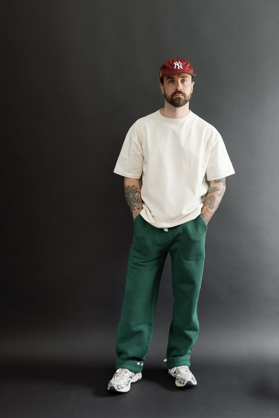 Full body front view of a male model, 5'9