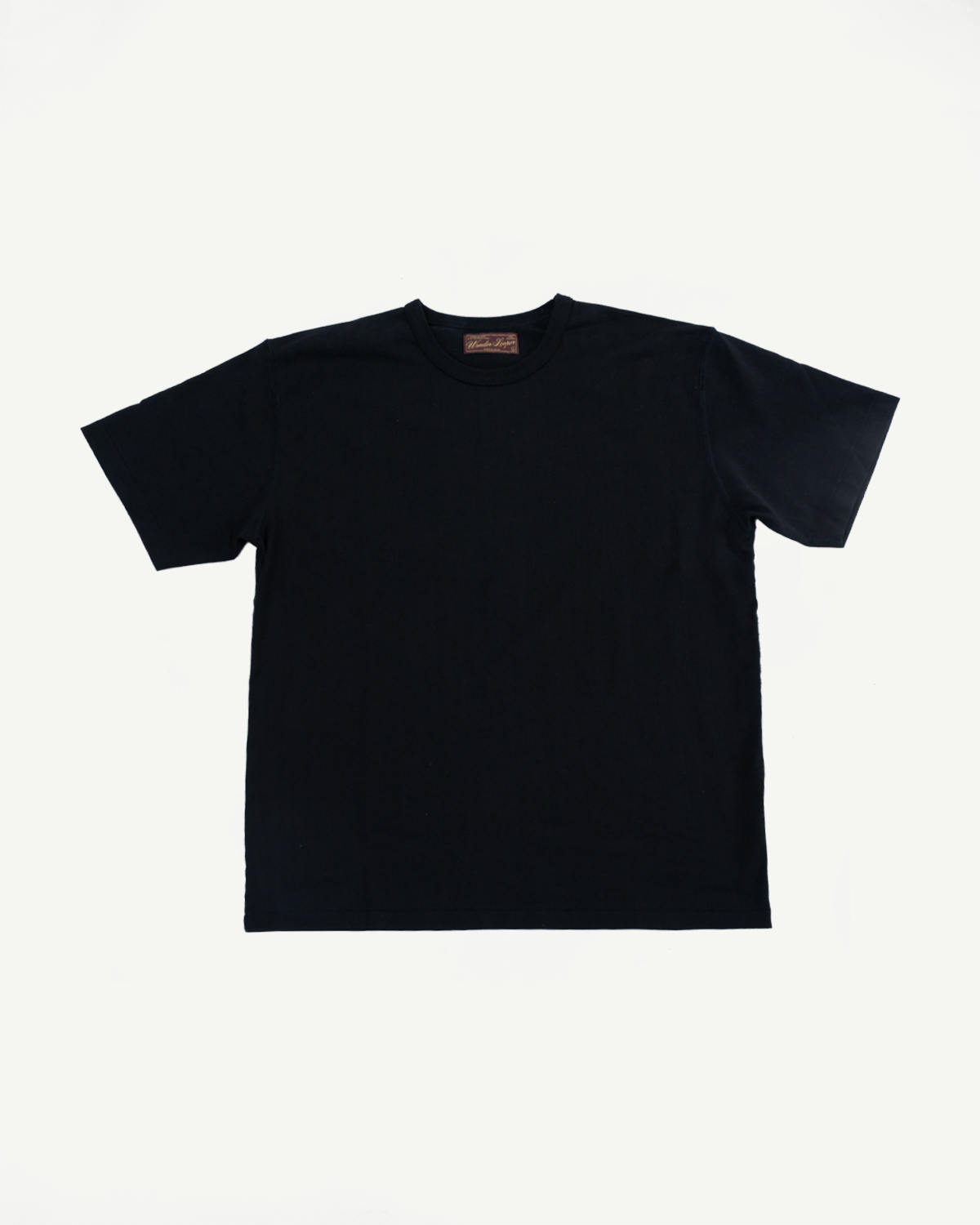 Ultimate Pima Tsuriami Crewneck T-Shirt - Black, crafted from smooth, organic Pima cotton, is flat-laid showcasing its short sleeves and crew neck, embodying Dant's premium menswear ethos.