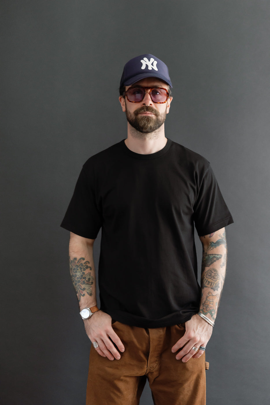 Full body front view of a male model, 5'9