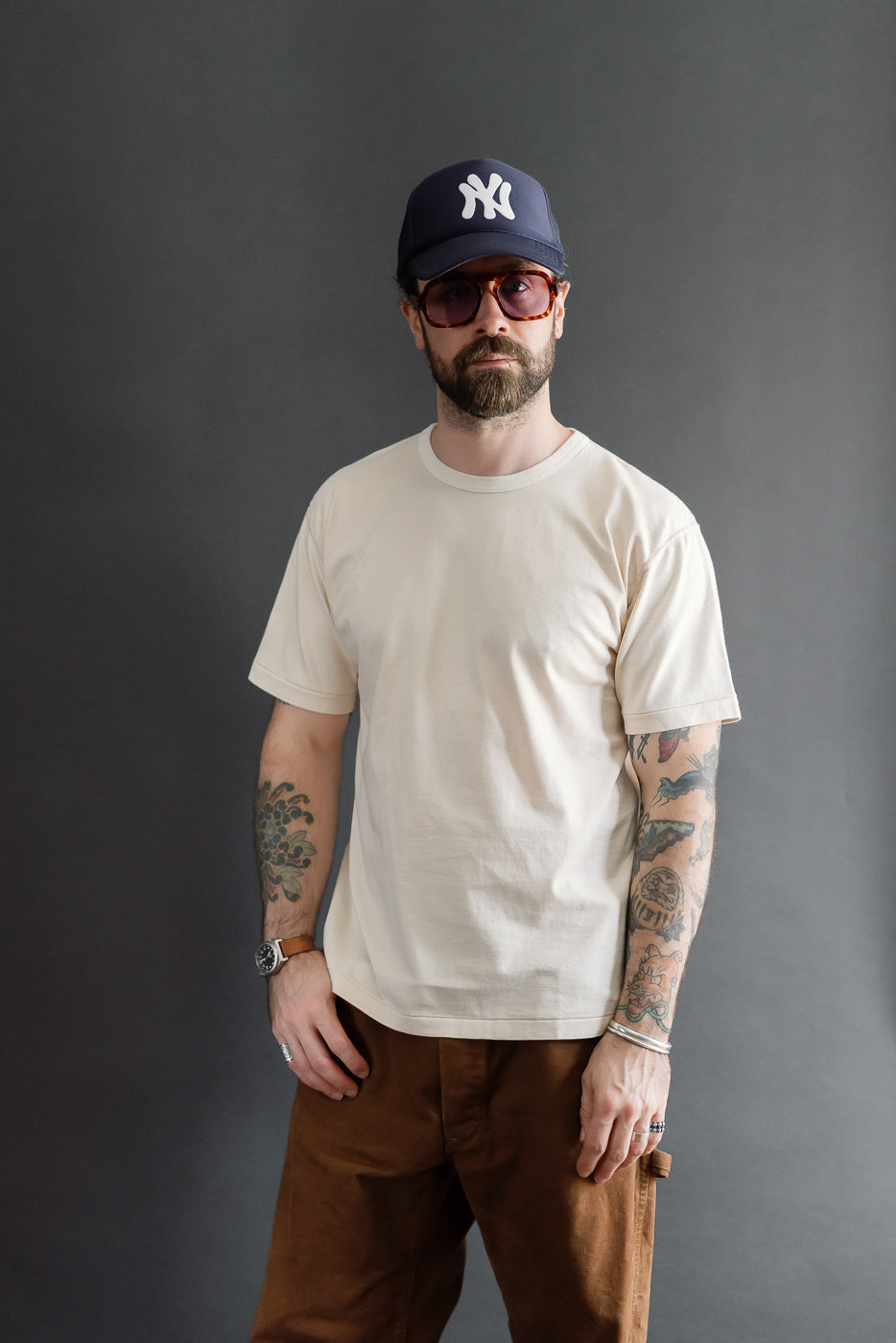 Full body front view of a male model, 5'9