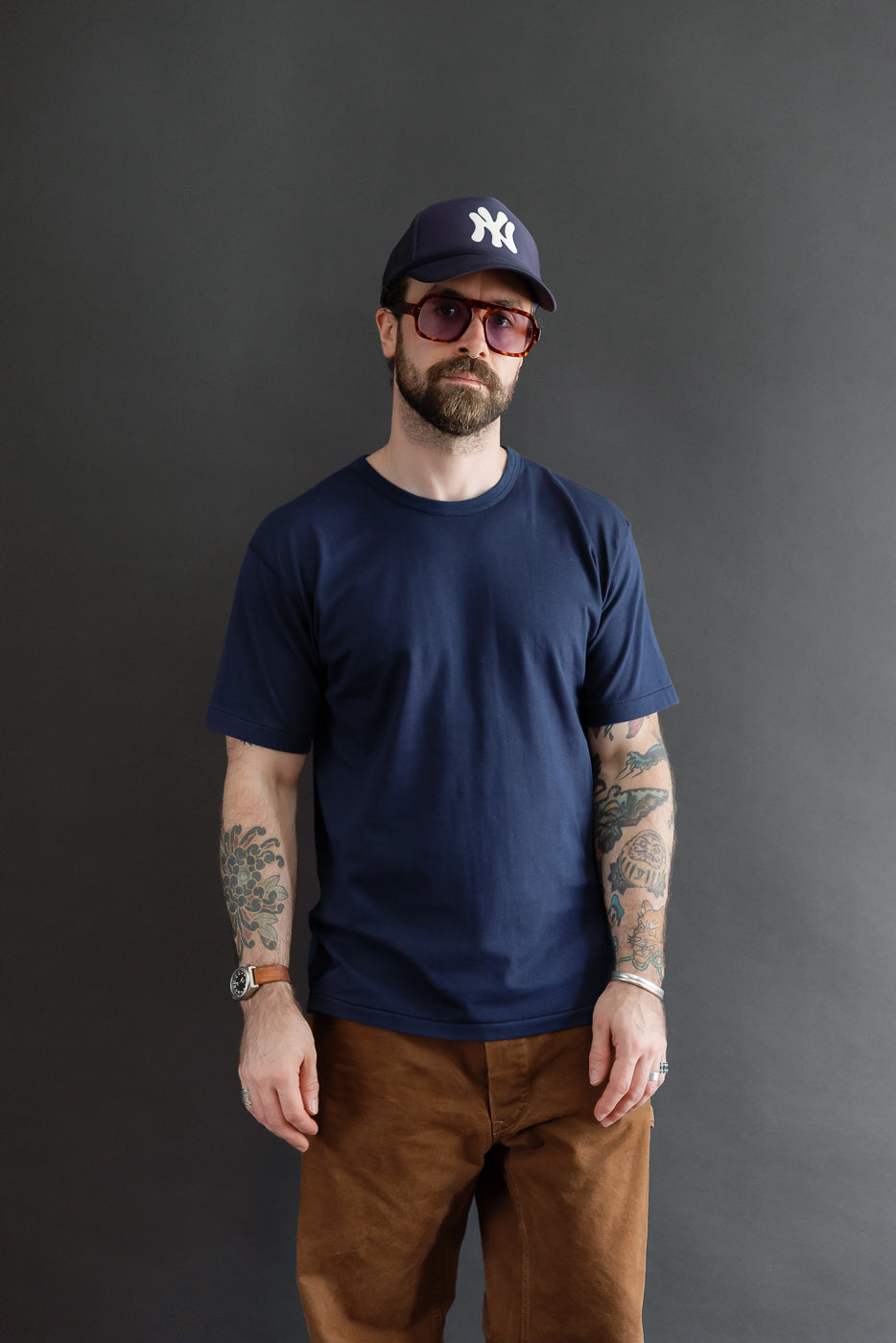 Full body front view of a male model, 5'9