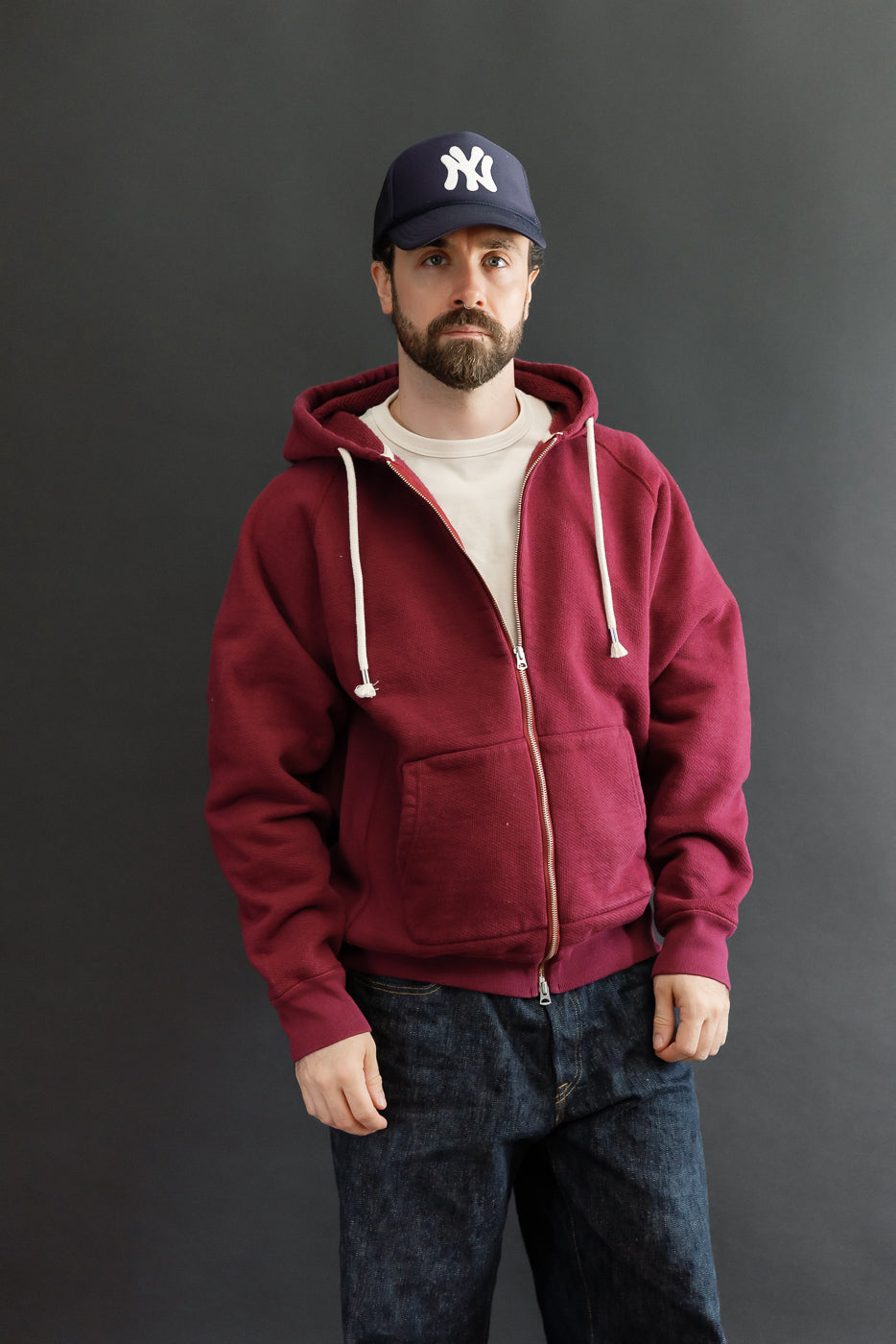 Full body front view of a male model, 5'9