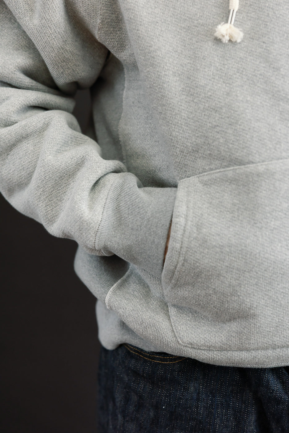 Close-up side view of a male model (5'9