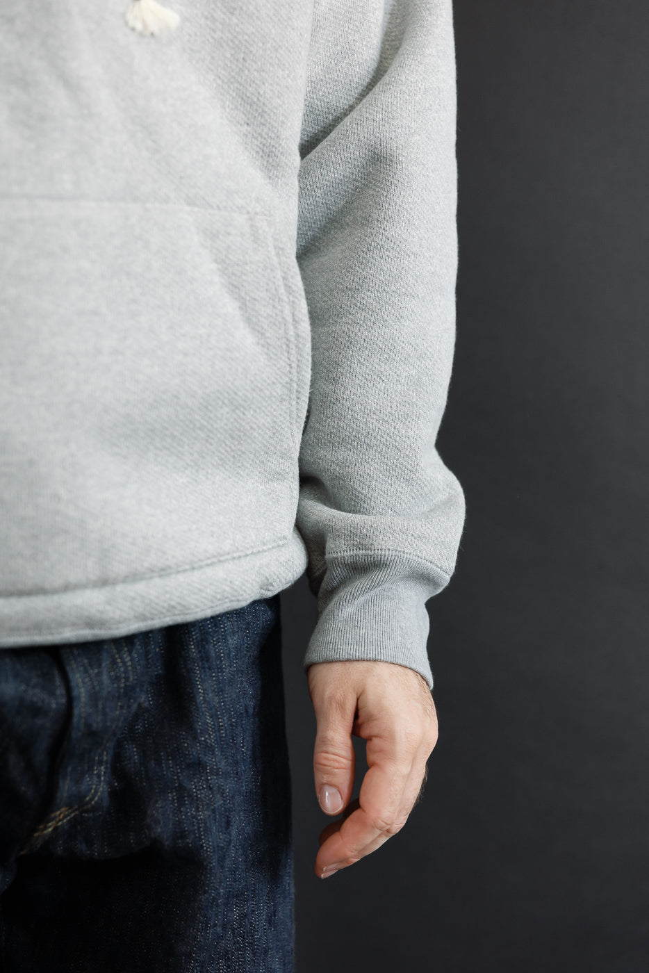 Close-up side view of a male model (5'9