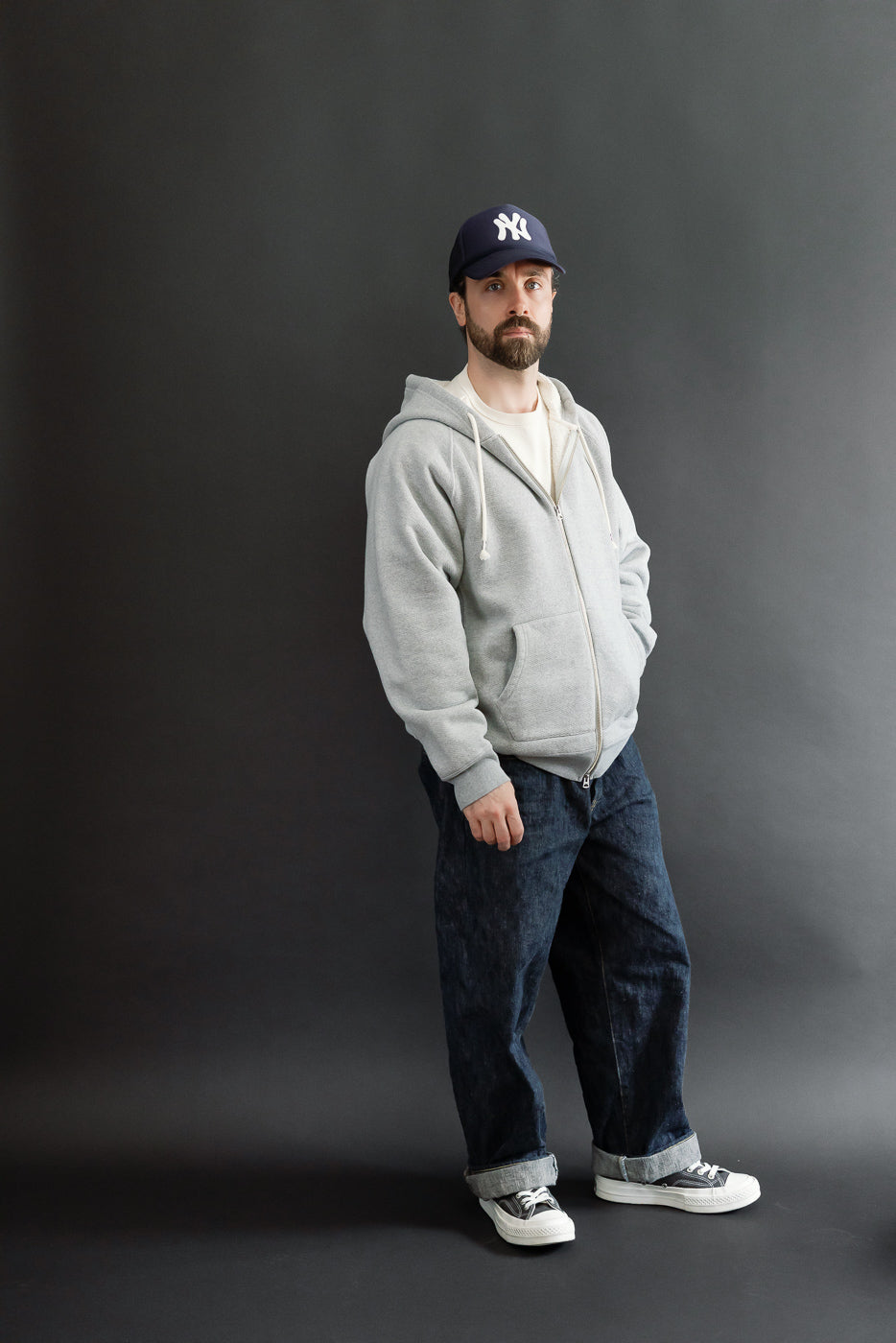 Full body front view of a male model, 5'9