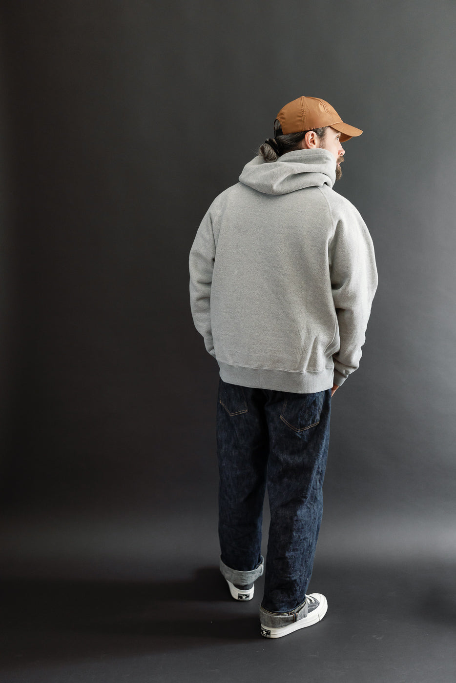 Full body back view of a male model, 5'9